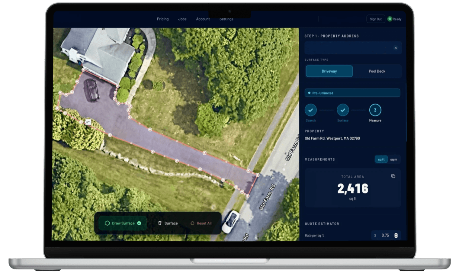 SurfaceMeasure on a laptop showing a traced driveway with total square footage and an estimated quote